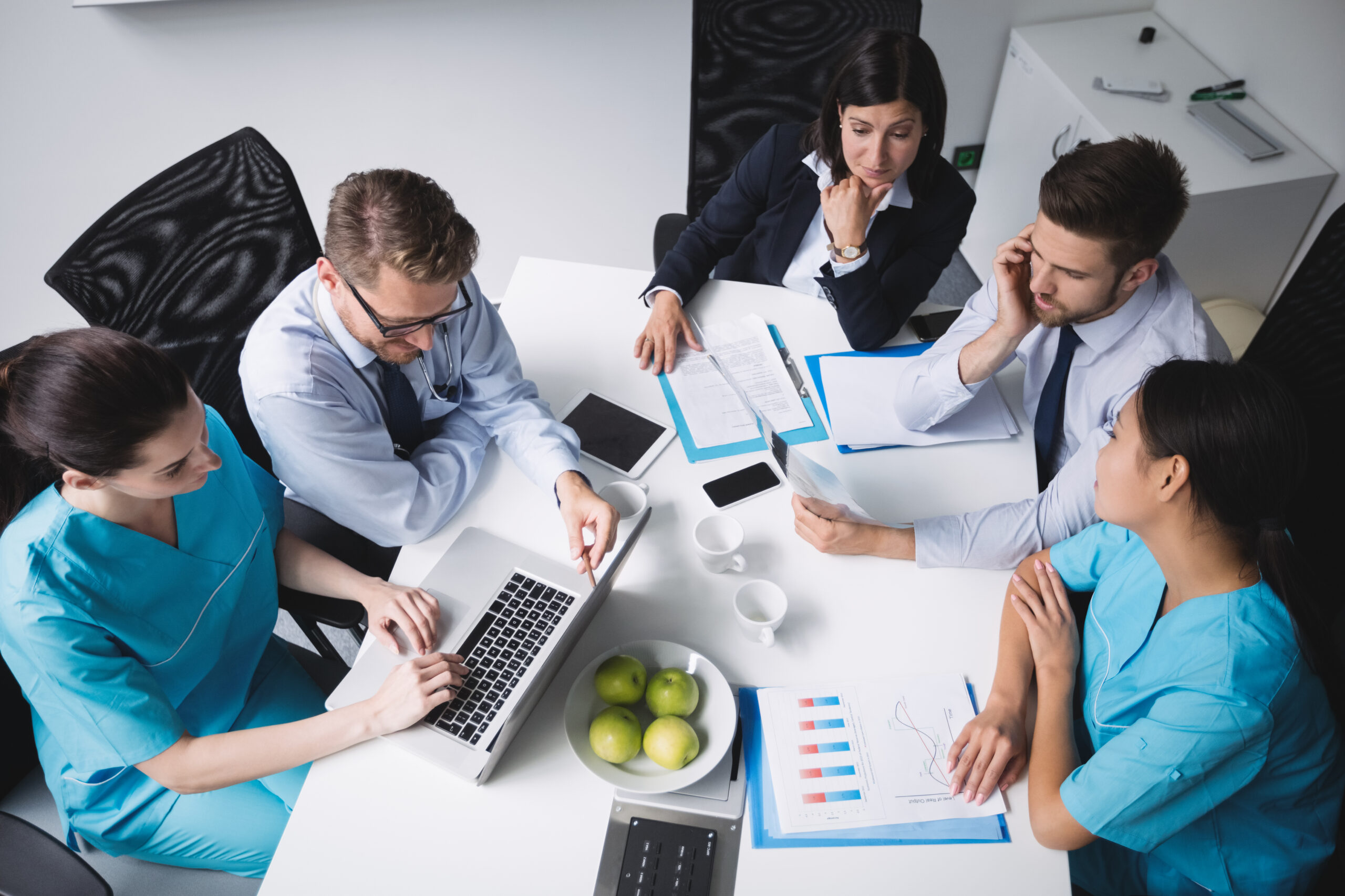 Team of doctors in a meeting at conference room for healthcare accounting